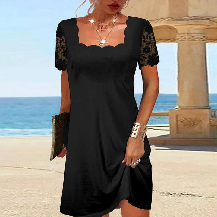 Maria | Midi-Kleid mit Bogensaum in Schwarz